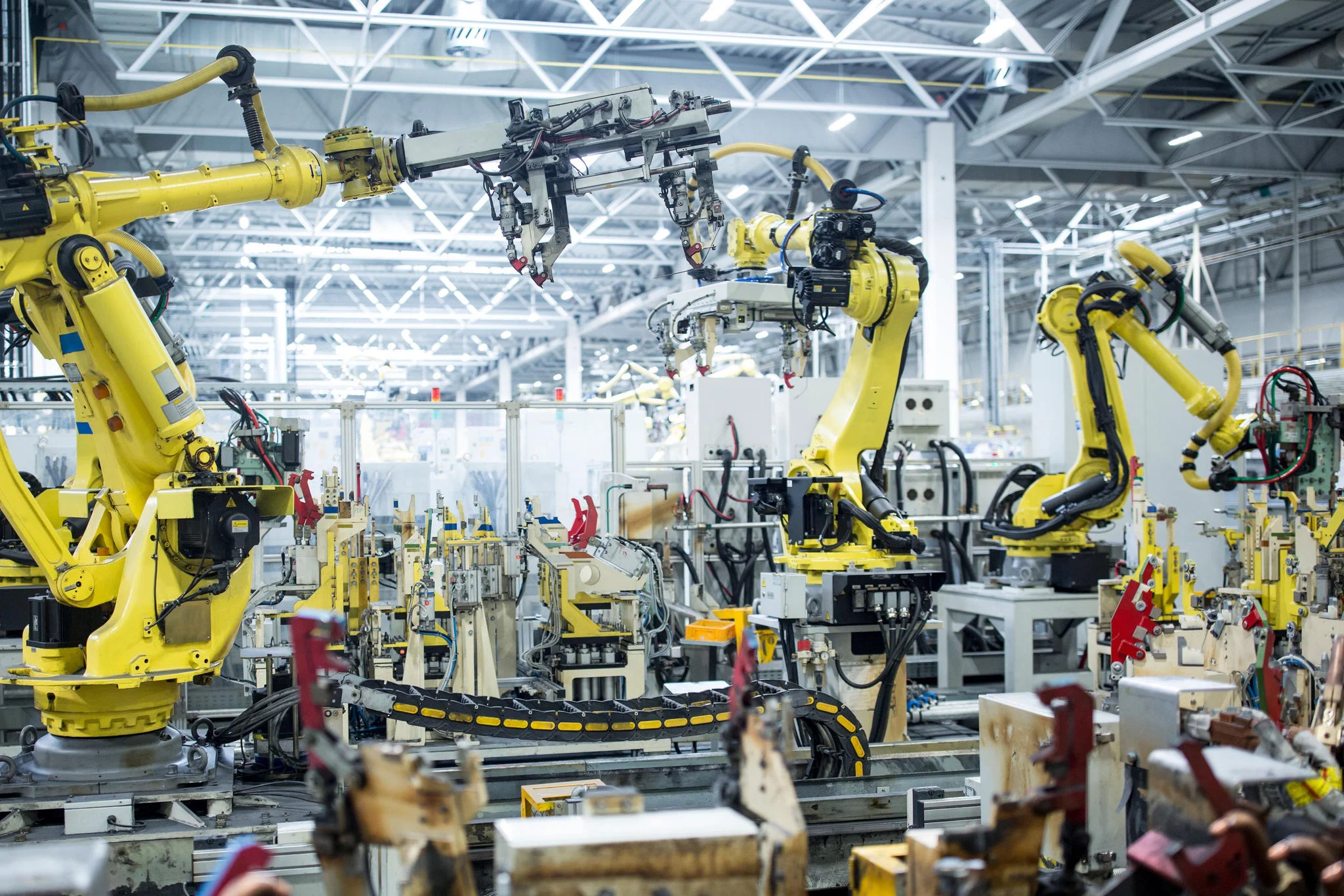 ey industrial robots in a car factory