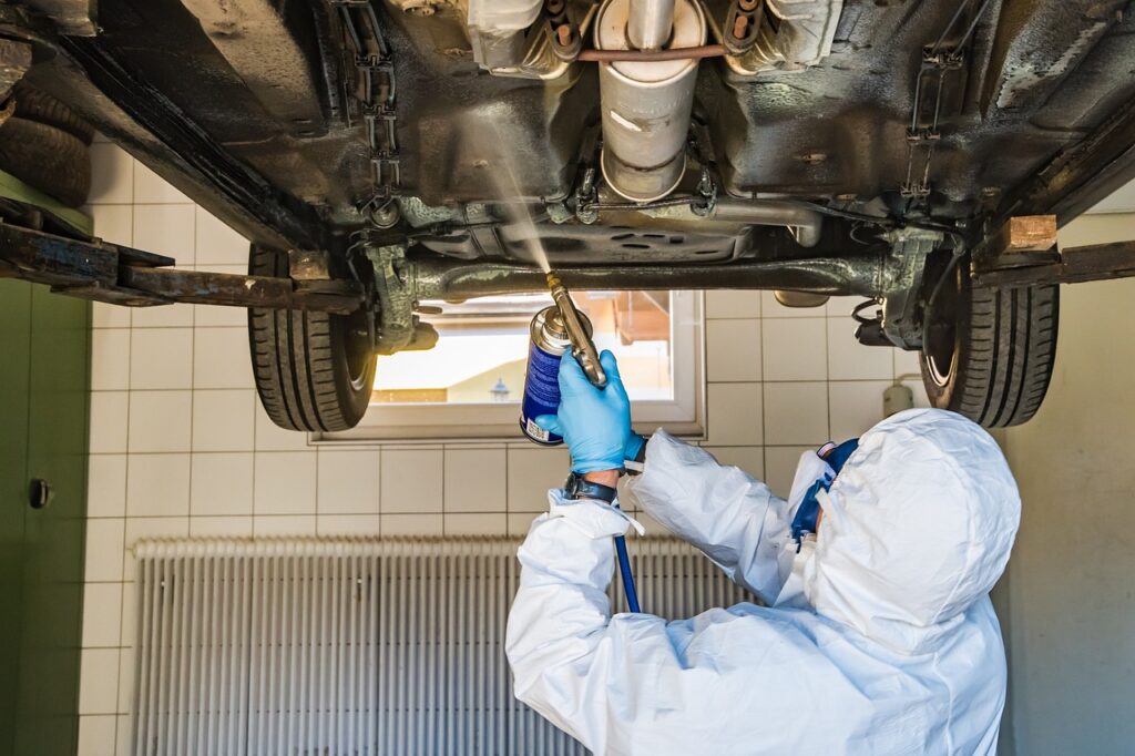 automobile, under floor, underbody protection, underbody wax, wax, corrosion protection, man, work, mechanic, preservation, workshop, spray, coating, mechanic, mechanic, workshop, workshop, workshop, workshop, workshop, spray