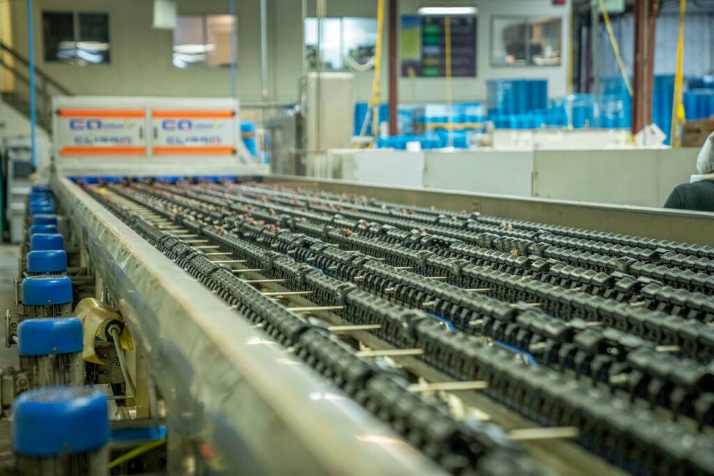 Detailed view of an industrial conveyor belt system used in manufacturing and production settings.